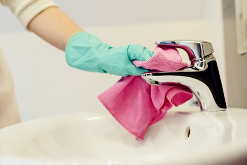 Professional sofa cleaning removing dirt from upholstered couch